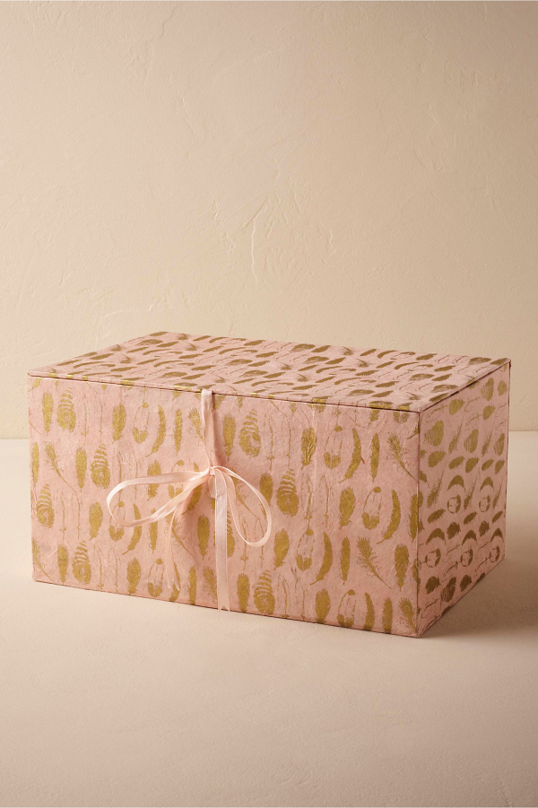 Gilded feather gift box