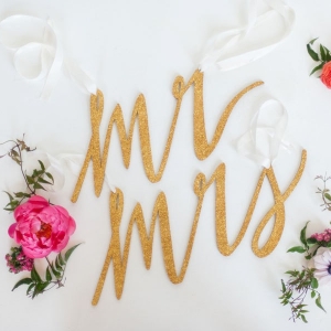 Mr. and Mrs. chair signs made out of glittered birch wood