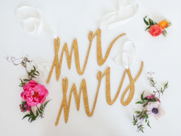 Mr. and Mrs. chair signs made out of glittered birch wood