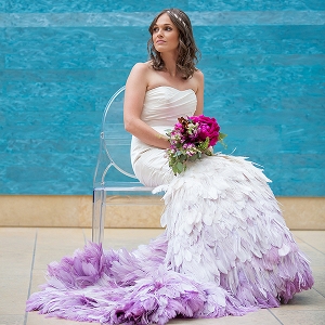 Feathered bridal gown with a purple ombre effect