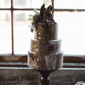 Marbled wedding cake with gold leaf
