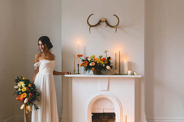 Fireplace altar with poppies and candles