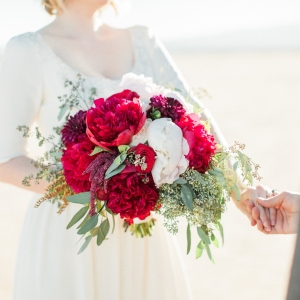 A bouquet of red peonies for a desert elopement in Las Vegas