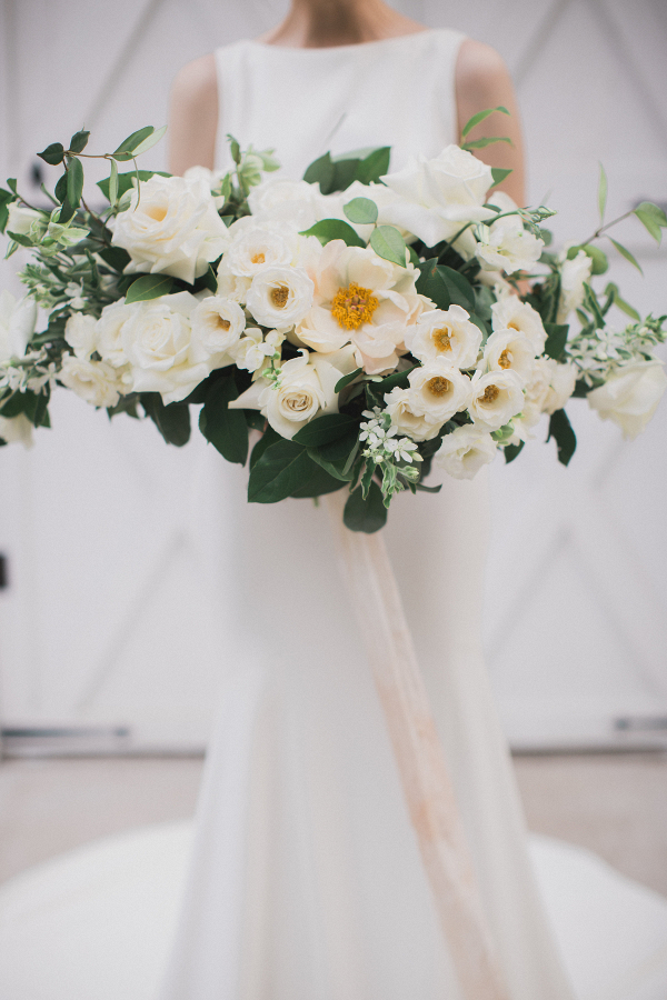 Lush white bouquet with greenery