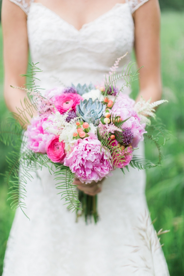 Earthy spring bouquet with pink peonies, succulents, scabiosas, ferns, and astilbe