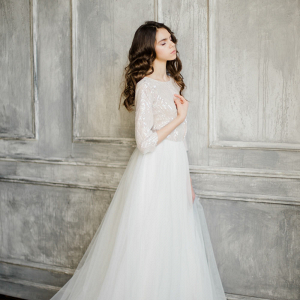 Three-Quarter-Sleeve Wedding Dress with a Layered Skirt