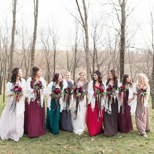 Winter bridesmaids in jewel-toned dresses