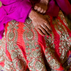 Indian Bride Wearing a Purple and Red Lengha