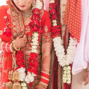 Indian Couple Standing Together at Wedding Ceremony