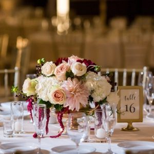 Classic pink and burgundy floral centerpiece