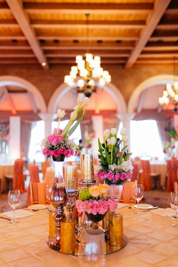 Modern orange and pink centerpiece on The Big Fat Indian Wedding