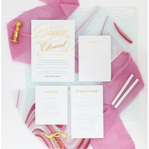 gold and white wedding invitation
