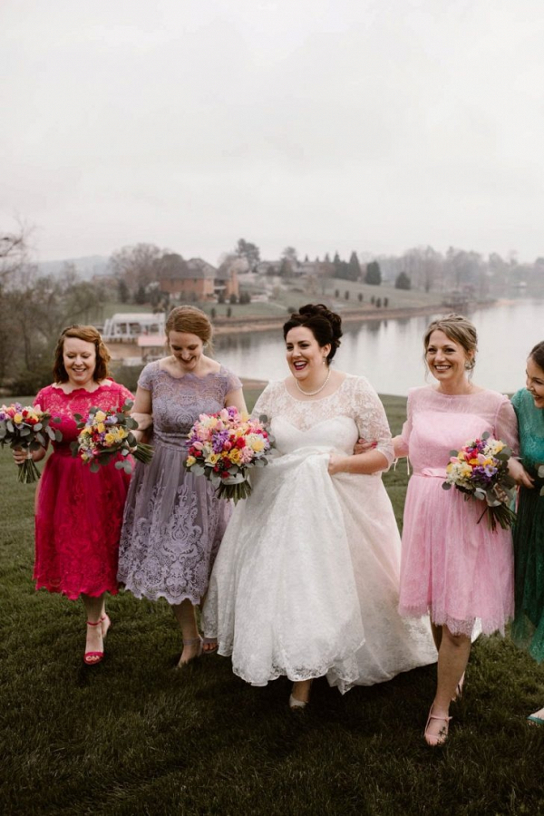 Bridesmaids in colorful vintage lace dresses