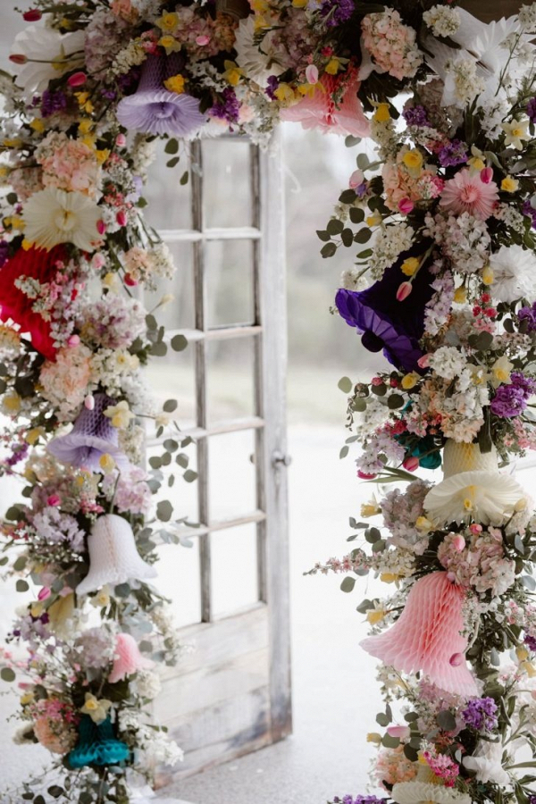 Floral arch with colorful paper bells