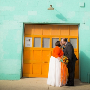 Colorful orange wedding shot by Amy Ann Photography