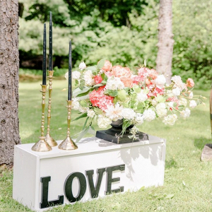 Floral decor and LOVE signage