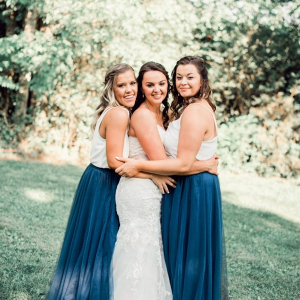 Bridesmaids in blue tulle skirts