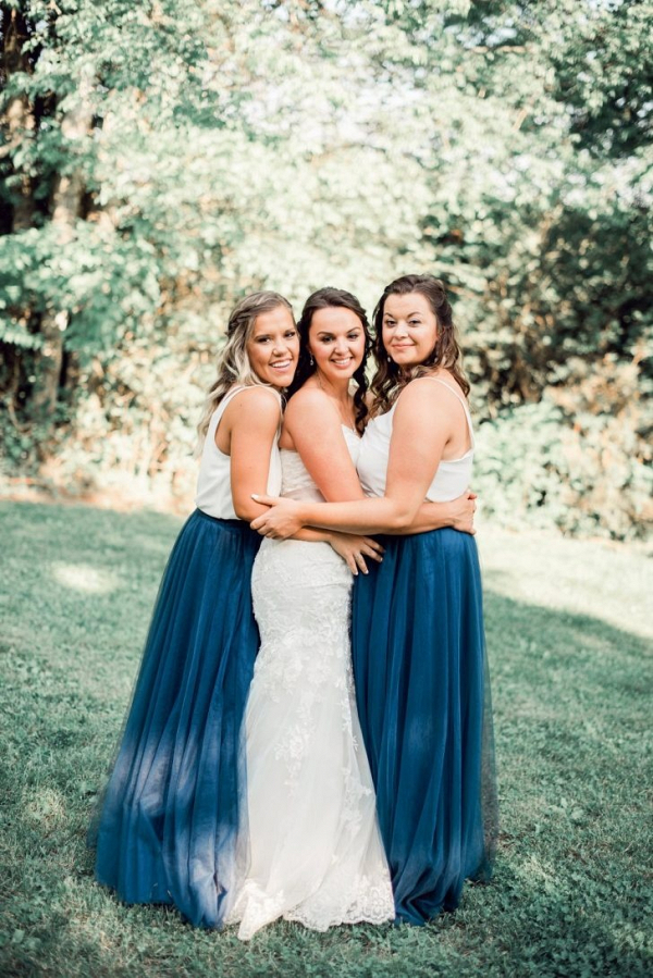 Bridesmaids in blue tulle skirts