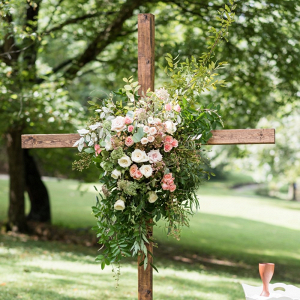 Ceremony cross decorated in florals