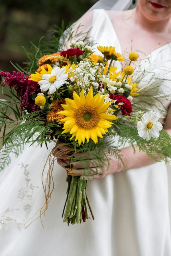 Rustic yellow and red bridal bouquet