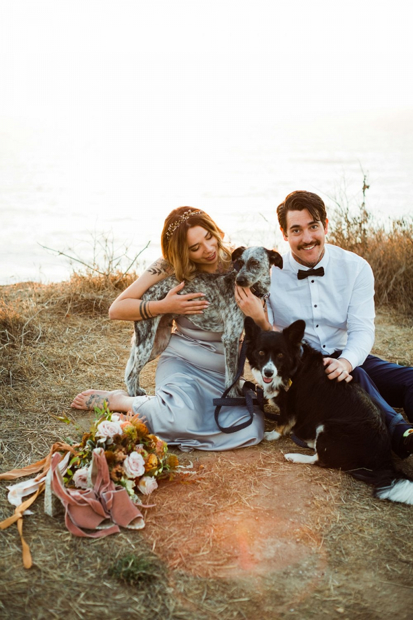 Coastal elopement portrait with dogs