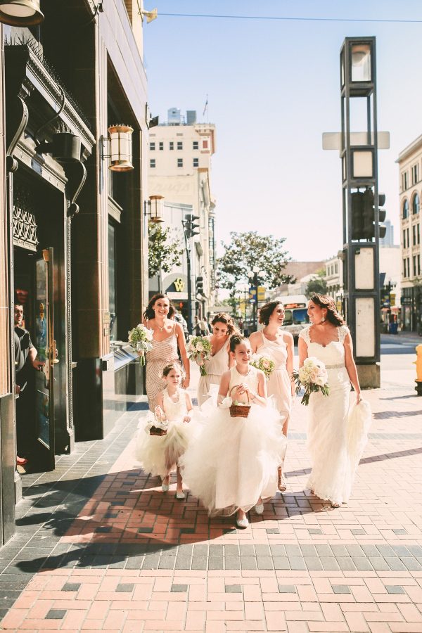 Bridesmaids in mismatched champagne dresses