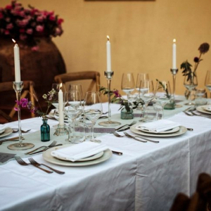 Tuscan wedding table with bud vase centerpieces