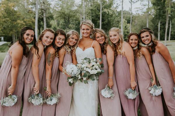 Blush Bridesmaid Dresses with Baby's Breath Bouquets