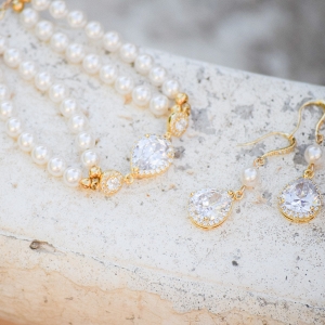 The Bridal Boutique  Gold + Pearl Bridal Jewelry Set by Estylo Jewelry