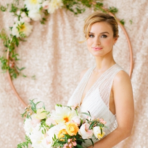 Gorgeous bride in front of rose gold backdrop, Betsi Ewing Photopraphy