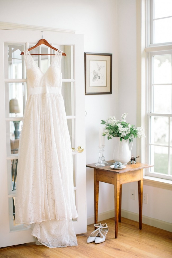 Wedding gown by Celia Grace, florals by Bespoke, Ashley Largesse Photography