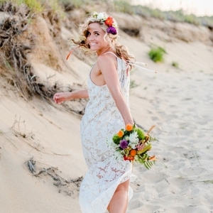 Playful beach bride