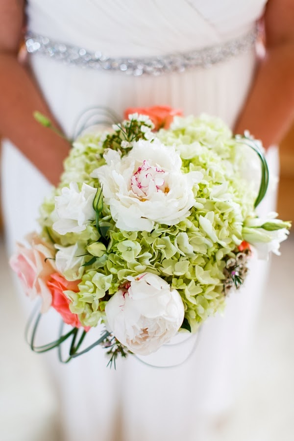 Green and coral bridal bouquet