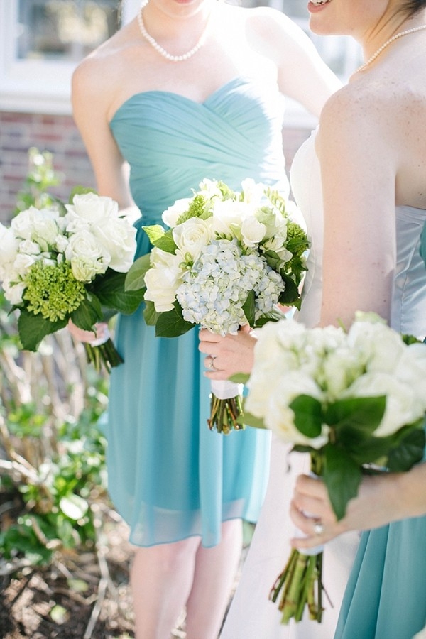 Teal bridesmaid dresses and hydrangea bouquets
