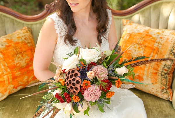 Fall boho wedding bouquet with feathers
