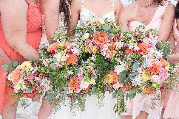 Coral colored wedding bouquets