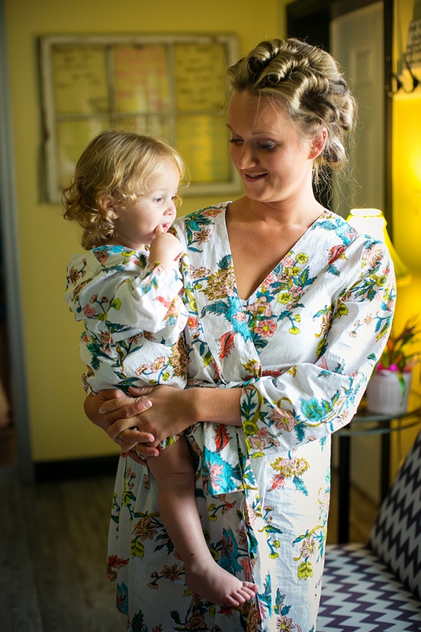 Mom and daughter wearing adorable matching floral robes