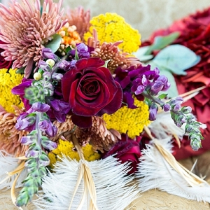 Colorful bridal bouquet with ostrich feathers