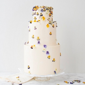 Dried pansy flowers on cake