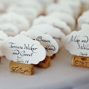 Scalloped calligraphy escort cards