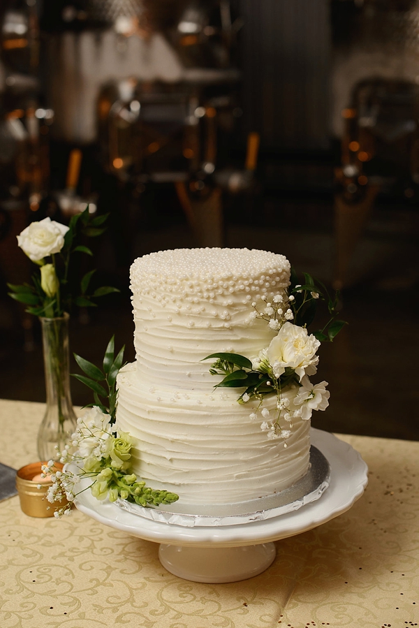 Textured white pearl wedding cake
