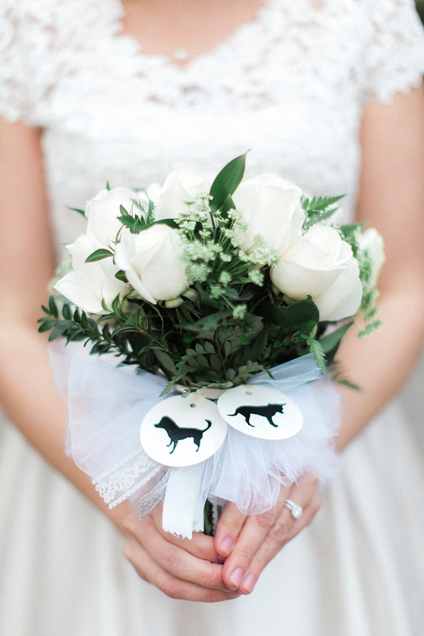 White wedding bouquet with dog silhouette bouquet charms