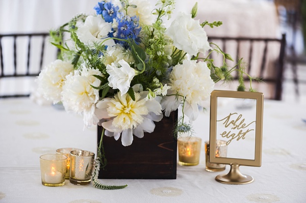 Flower centerpiece with gold frame table number