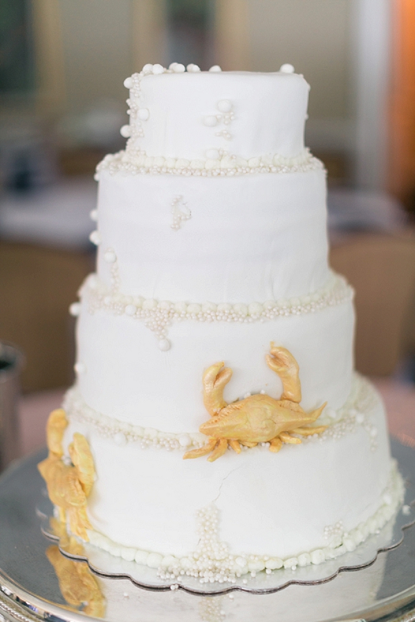Adorable golden crab wedding cake