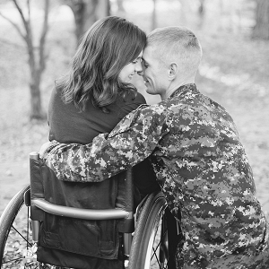 beautiful engaged couple in wheelchair