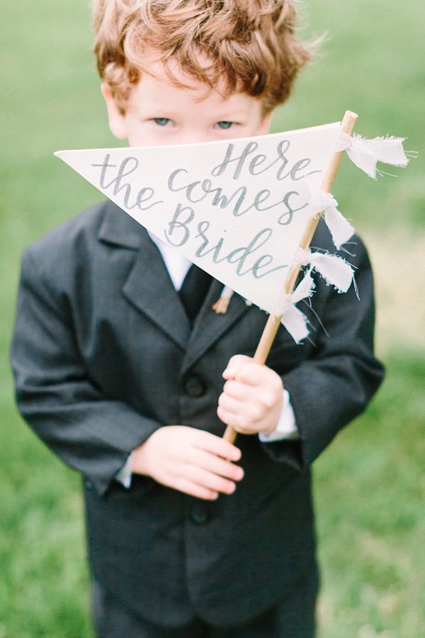 Ring bearer with calligraphy sign