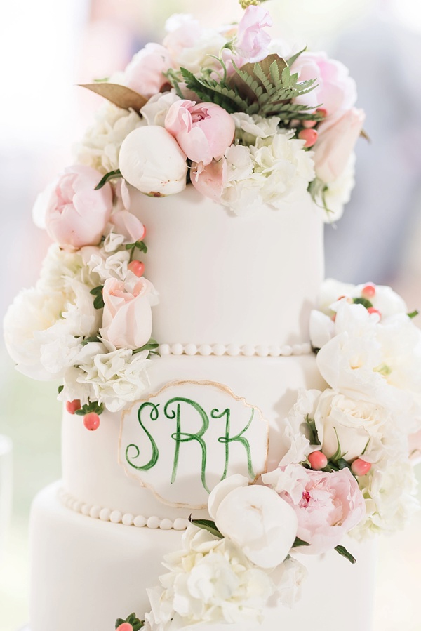 Pink and green monogram wedding cake