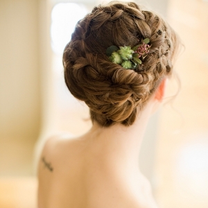Bridal updo with succulents