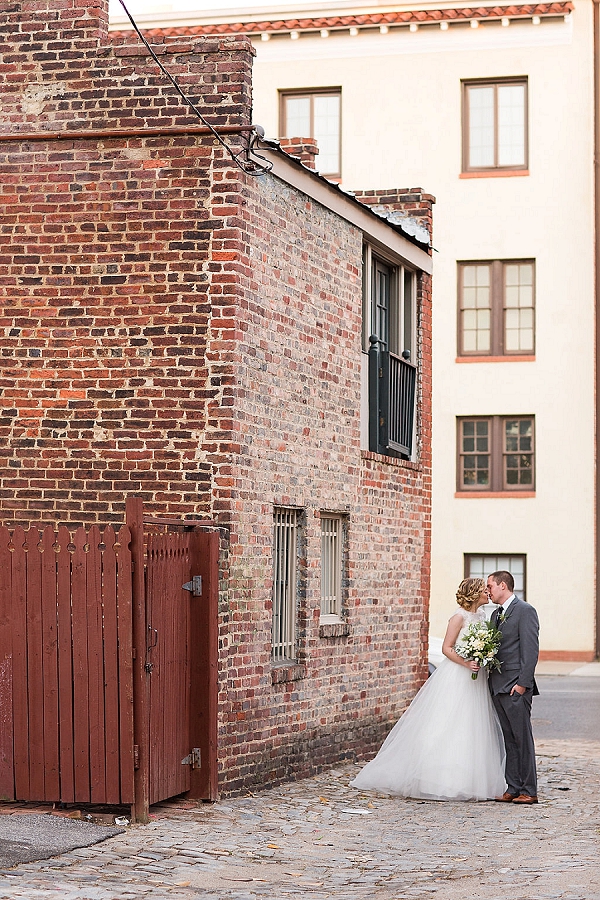Bride and groom in urban setting