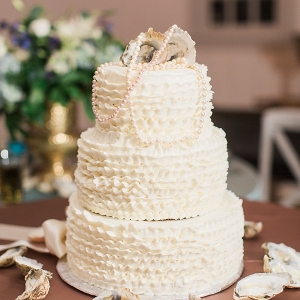 Wedding cake with oyster shells and pearls